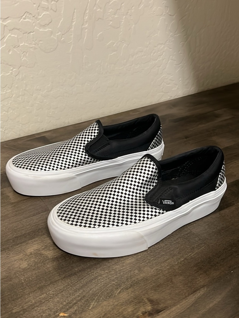 Vans Checkerboard Slip-On Sneakers in Black and White